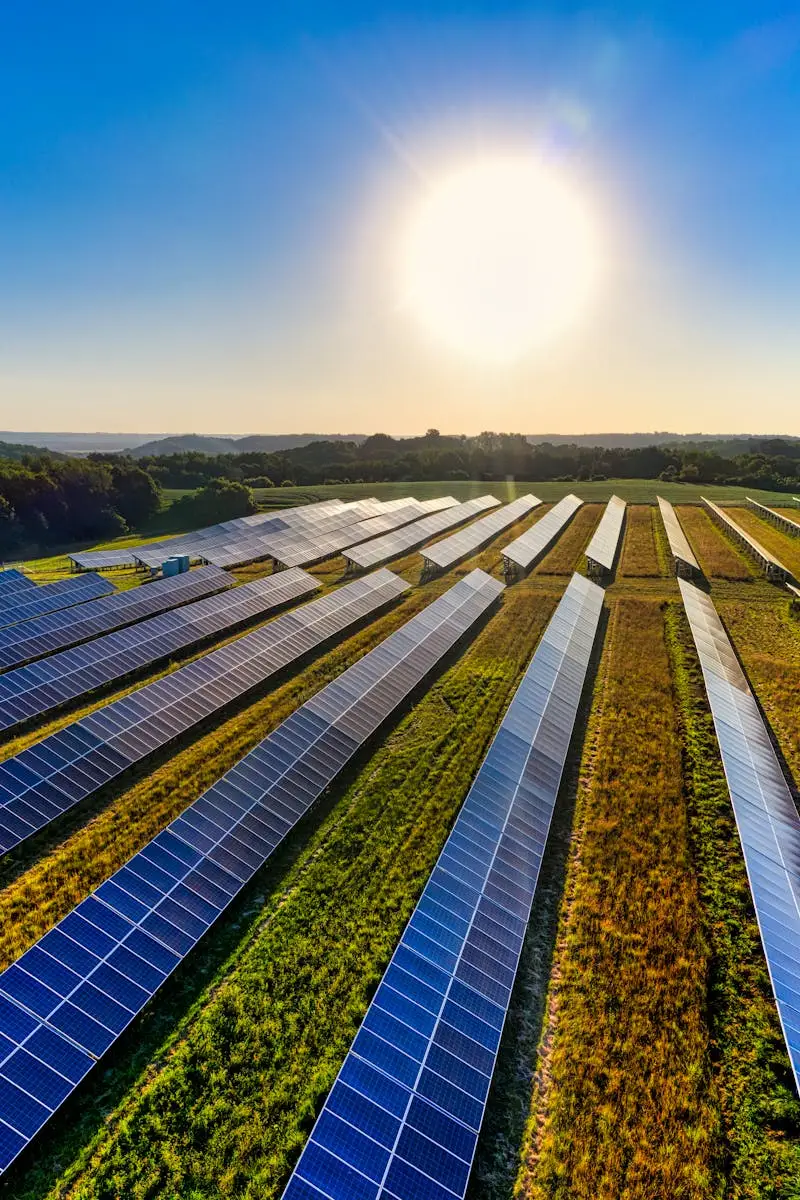 Aerial view of a solar farm in Red Wing, MN, with solar panels harnessing the sun's energy.